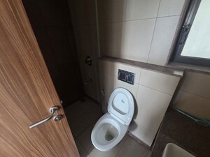 Bathroom in 2 BHK Apartment at Shapurji Palanji Compound, Parel – for Rent