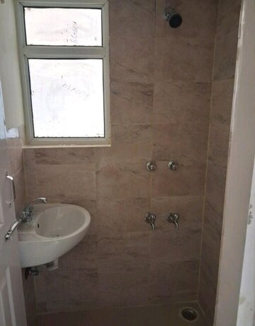 Bathroom in 1 BHK Apartment at Wave Dream Homes, Wave City – for Rent