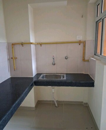 Kitchen in 1 BHK Apartment at Wave Dream Homes, Wave City – for Rent