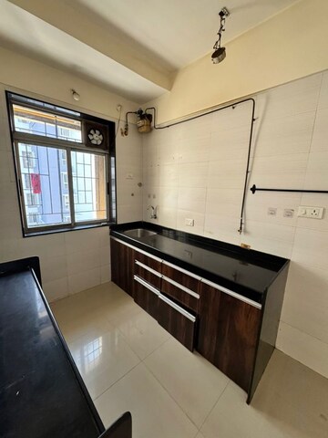 Kitchen in 3 BHK Apartment at Sheth Vasant Athena, Laxmi Nagar – for Sale