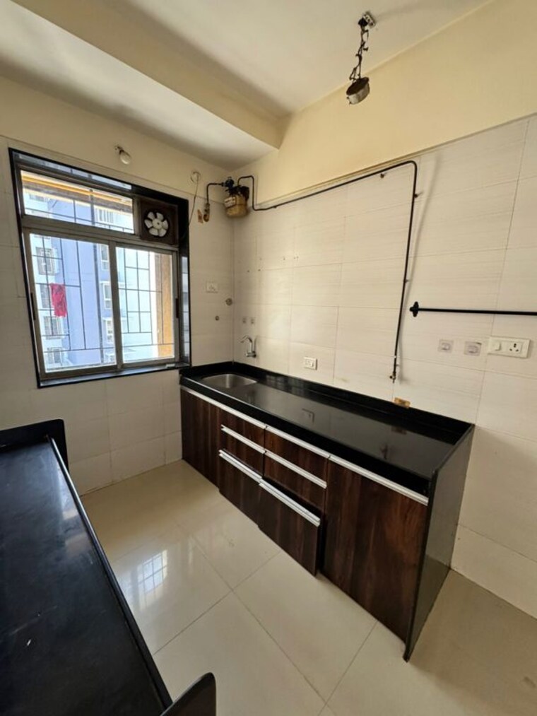 Kitchen, sheth-vasant-athena 3 Bedroom 781 Sq.Ft. Apartment In Laxmi Nagar Thane 10088223