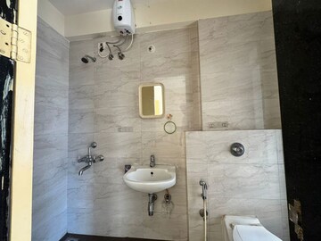 Bathroom in 3 BHK Apartment at Sheth Vasant Athena, Laxmi Nagar – for Sale