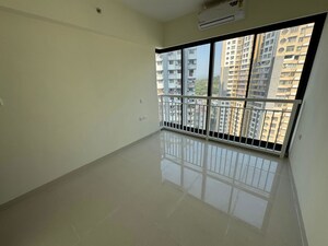 Room in 2 BHK Apartment at Dynamix Divum, Malad East – for Rent
