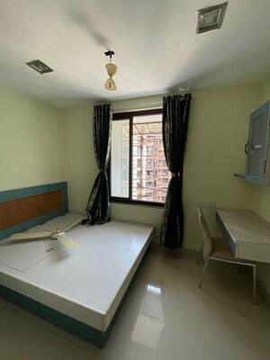 Bedroom in 2 BHK Apartment at Emgee Janki Kutir, Juhu – for Rent