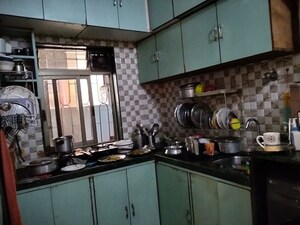 Kitchen in 2 BHK Apartment at Rising Sun Apartments Juhu, Juhu – for Rent