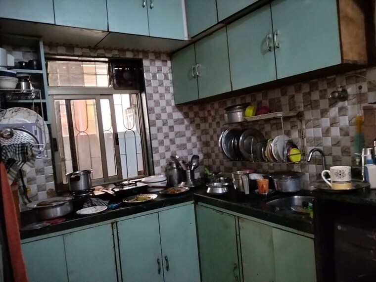 Kitchen, rising-sun-apartments-juhu 2 Bedroom 900 Sq.Ft. Apartment In Juhu Mumbai 10088273