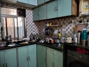 Kitchen in 2 BHK Apartment at Rising Sun Apartments Juhu, Juhu – for Rent