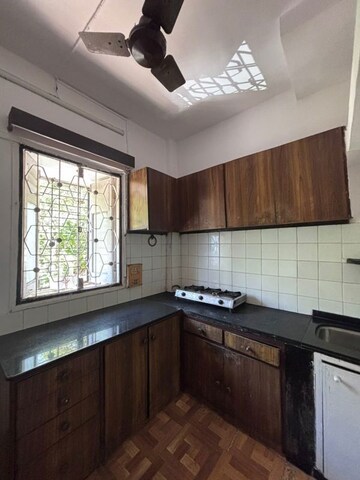 Kitchen in 2 BHK Apartment at Kalumal Estate, Juhu – for Rent