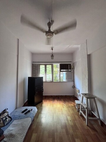 Living Room in 2 BHK Apartment at Kalumal Estate, Juhu – for Rent