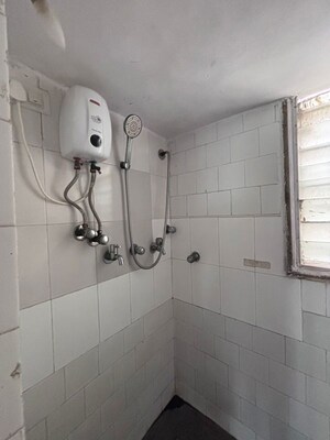 Bathroom in 2 BHK Apartment at Kalumal Estate, Juhu – for Rent