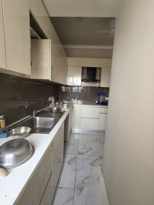 Kitchen in 3 BHK Apartment at Central Park Flower Valley Aqua Front Towers, Sohna Sector 33 – for Rent
