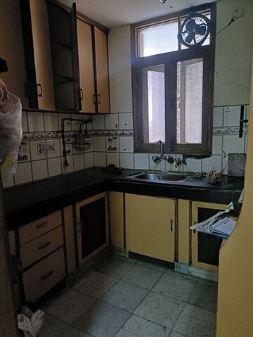 Kitchen in 3 BHK Apartment at Abhiyanta Apartment, Vasundhara Enclave – for Sale