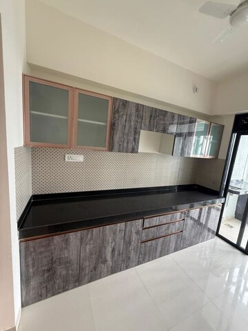 Kitchen in 4 BHK Apartment at Rajesh Raj Infinia, Malad West – for Rent