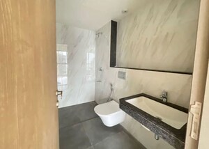 Bathroom in 4 BHK Apartment at Rajesh Raj Infinia, Malad West – for Rent