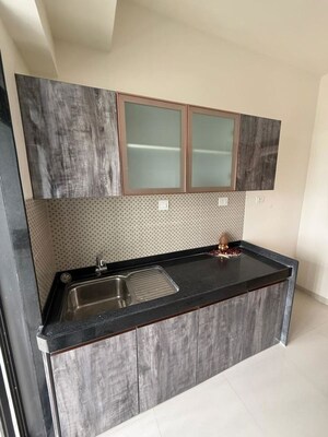 Kitchen in 4 BHK Apartment at Rajesh Raj Infinia, Malad West – for Rent