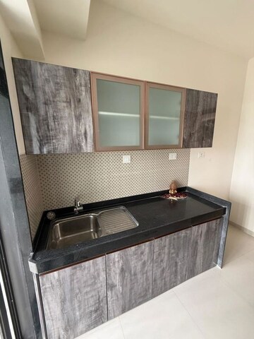 Kitchen in 4 BHK Apartment at Rajesh Raj Infinia, Malad West – for Rent