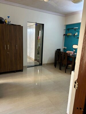 Room in 1 BHK Apartment at Empire Tower, Andheri West – for Rent