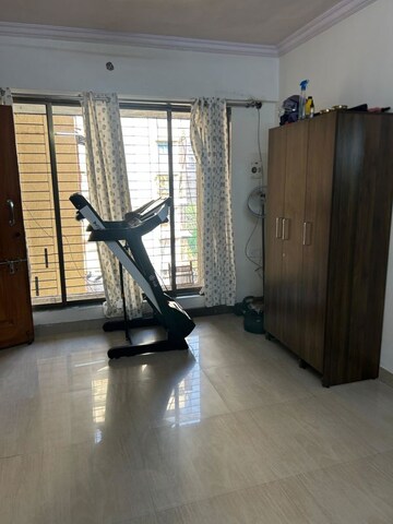Living Room in 1 BHK Apartment at Empire Tower, Andheri West – for Rent