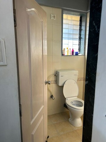 Bathroom in 1 BHK Apartment at Empire Tower, Andheri West – for Rent