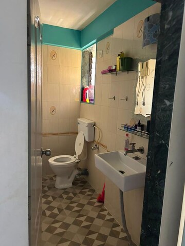 Bathroom in 1 BHK Apartment at Empire Tower, Andheri West – for Rent