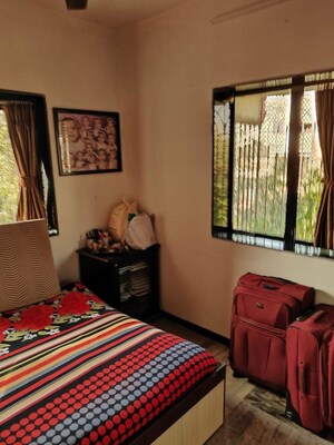 Bedroom in 1 BHK Apartment at Empire Tower, Andheri West – for Rent