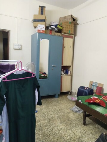Bedroom in 2 BHK Apartment at Gita Society, Camp – for Rent