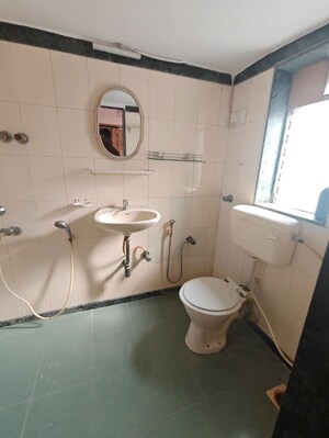 Bathroom in 3 BHK Apartment at Juhu Scheme, Juhu – for Rent