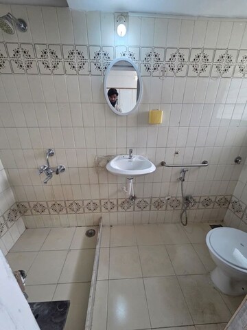 Bathroom in 3 BHK Apartment at Juhu Scheme, Juhu – for Rent