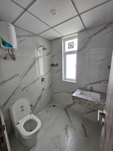 Bathroom in 3.5 BHK Builder Floor at Smart World Gems, Sector 89 – for Rent