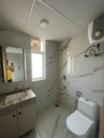 Bathroom in 2.5 BHK Builder Floor at Smart World Gems, Sector 89 – for Rent