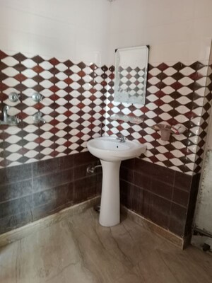 Washroom in 1.5 BHK Builder Floor at Huda – for Rent