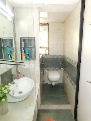 Bathroom in 4 BHK Apartment at Om Castle, Juhu – for Sale