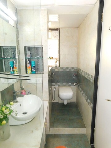 Bathroom in 4 BHK Apartment at Om Castle, Juhu – for Sale