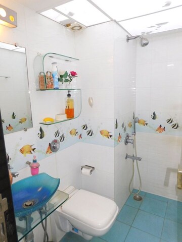 Bathroom in 4 BHK Apartment at Om Castle, Juhu – for Sale
