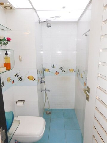 Bathroom in 4 BHK Apartment at Om Castle, Juhu – for Sale