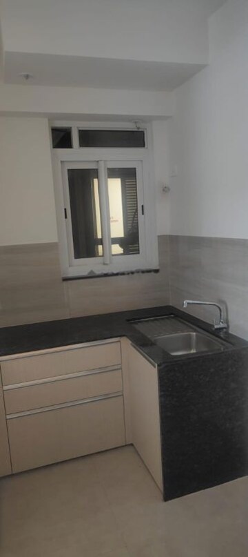 Kitchen in 2 BHK Apartment at Dosti West County, Balkum Pada – for Rent