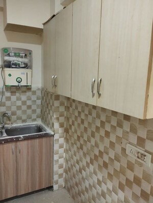 Kitchen in 2 BHK Apartment at Mahagun Mywoods, Sector 16c Greater Noida – for Rent