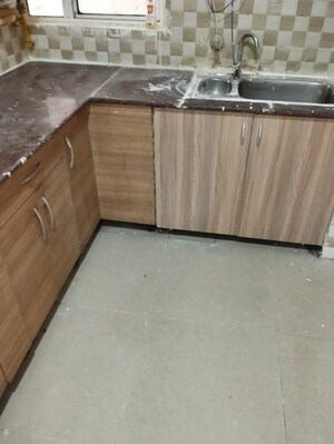 Kitchen in 2 BHK Apartment at Mahagun Mywoods, Sector 16c Greater Noida – for Rent