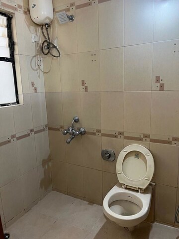 Bathroom in 2 BHK Apartment at Simran Corner, Pimple Saudagar – for Rent