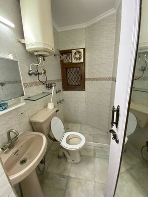 Bathroom in 3 BHK Builder Floor at Green Park – for Sale