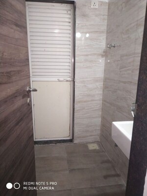 Bathroom in 1 BHK Apartment at Squarefeet Ace Square, Thane West – for Rent