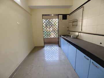 Kitchen in 2 BHK Apartment at Swapnalok Towers, Malad East – for Rent