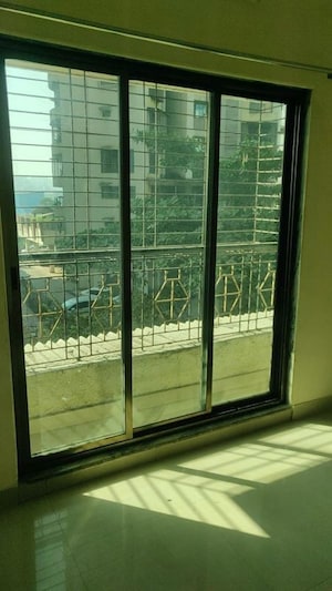 Bedroom in 2 BHK Apartment at Bharat Sanskar CHS, Kharghar Sector 18 – for Rent