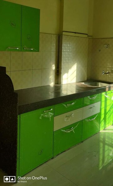 Kitchen in 2 BHK Apartment at Bharat Sanskar CHS, Kharghar Sector 18 – for Rent