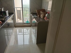 Kitchen in 1 BHK Apartment at Vihang Vermont, Ghodbunder Road – for Sale