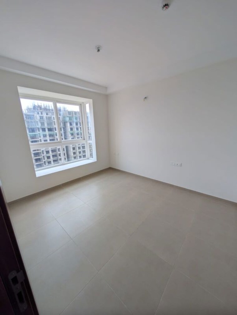 Room, bhartiya-city-nikoo-homes-4 1 Bedroom 675 Sq.Ft. Apartment In Thanisandra Main Road Bangalore 10089069