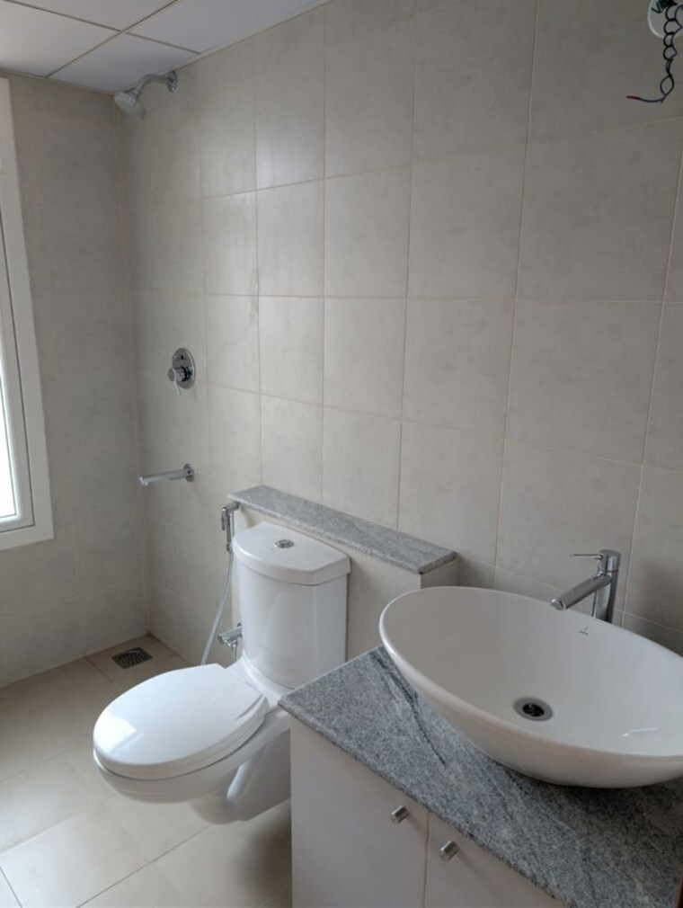 Bathroom, bhartiya-city-nikoo-homes-4 1 Bedroom 675 Sq.Ft. Apartment In Thanisandra Main Road Bangalore 10089069