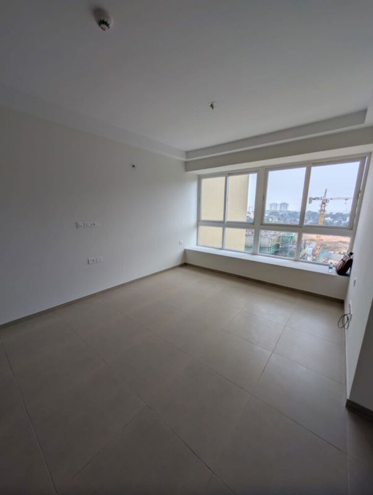 Room, bhartiya-city-nikoo-homes-4 1 Bedroom 675 Sq.Ft. Apartment In Thanisandra Main Road Bangalore 10089069