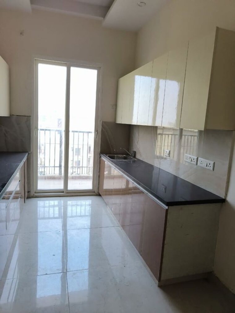 Kitchen, maxblis-grand-wellington 4 Bedroom 2050 Sq.Ft. Apartment In Sector 75 Noida 10089094