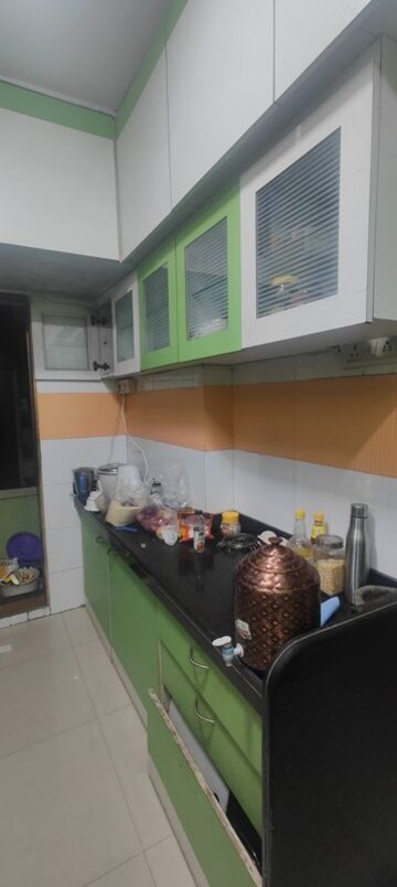 Kitchen in 3 BHK Apartment at Sandstone CHS Ltd, Mira Road – for Rent